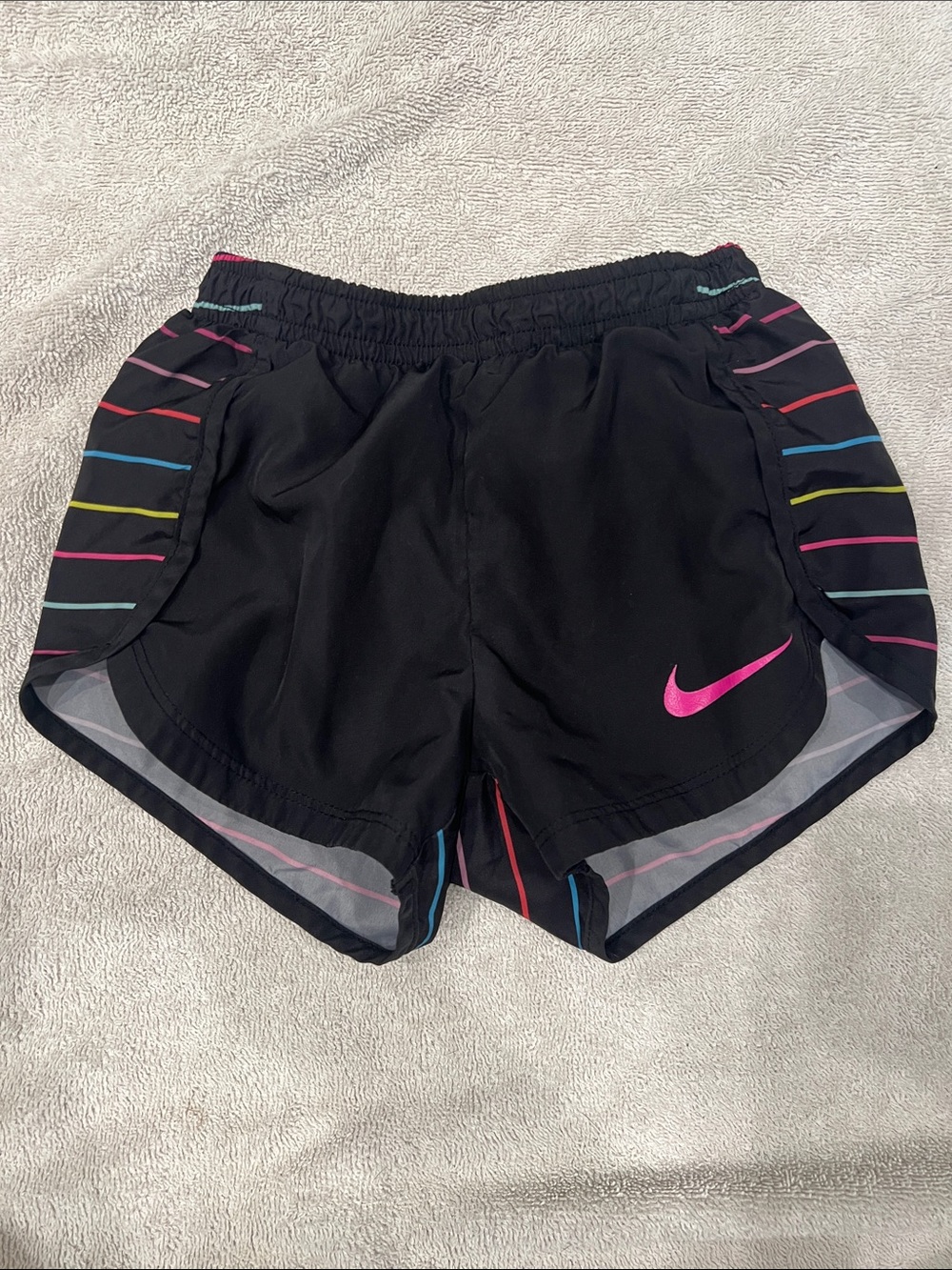 Nike Black Athletic Shorts with Pink Swoosh and Multicolor Stripes